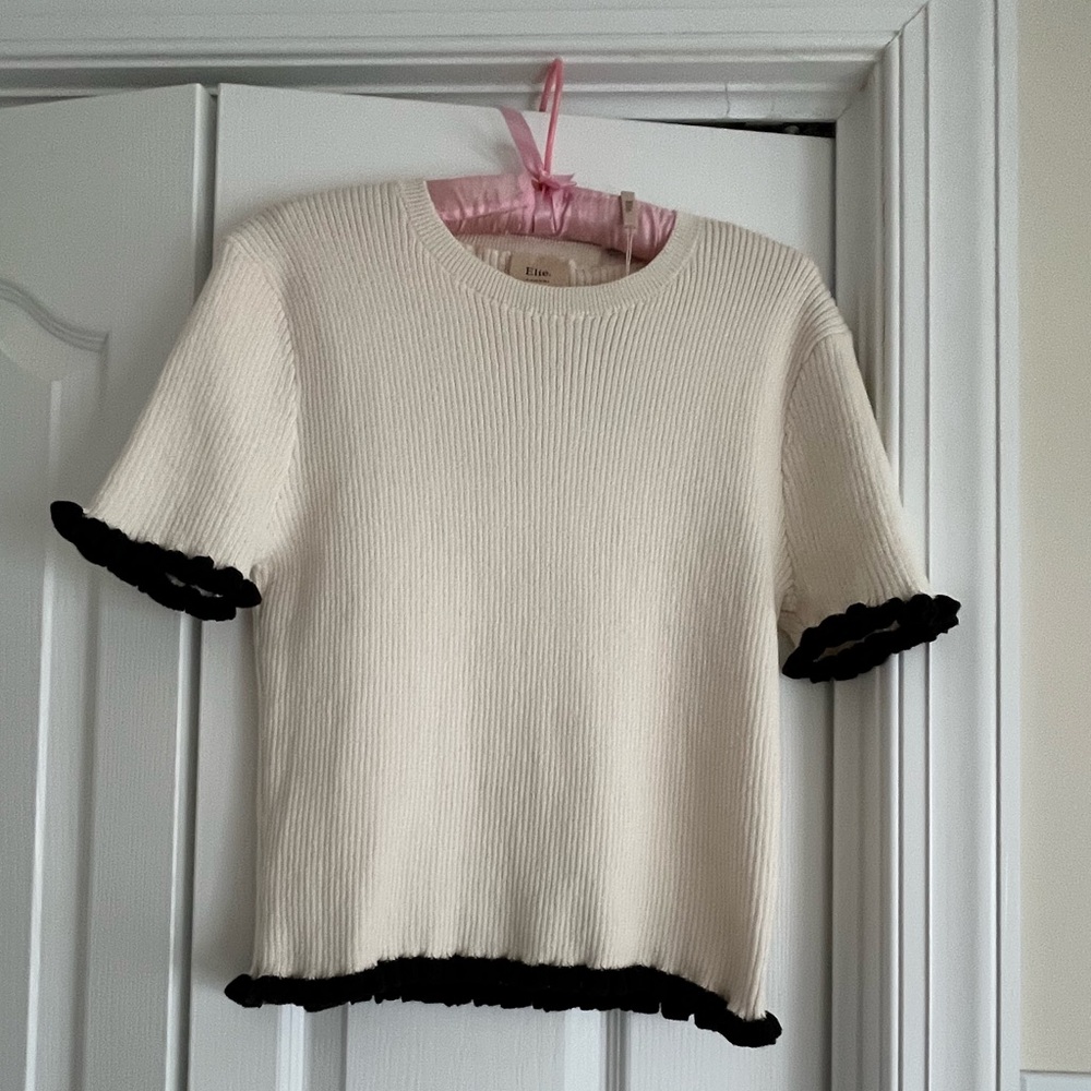 Women’s Elie Tahari Cream and Black Ruffle Trim Top.
